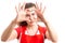 Joyful woman supermarket employee making heart sign with hands