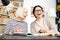 Joyful woman tutoring to senior woman