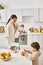 joyous attractive woman preparing breakfast for