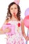 Joyous girl with balloons and gift box