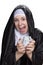 Joyous nun with money