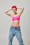 joyous woman in fashionable crop top