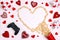 Joystick, popcorn heart, gifts and candles on white background with copy space