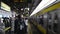 JR Yamanote train station platform with passengers Ochanomizu Station, Tokyo