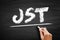 JST - Joint Supervisory Team acronym, business concept on blackboard