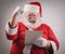 Jubilant technological Santa Claus