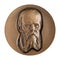 Jubilee medal large desktop medallion Russian writer philosopher Fyodor Dostoevsky close-up illustrative editorial