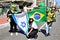 Juciane Cunha with patriots hold Israel and Brazil flag on Paulista avenue