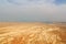 Judaean Desert panorama with wadis and salt lake dead sea seen from Masada fortress, Israel