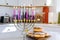 Judaism tradition family religious holiday symbols lighting hanukkiah menorah candles during Hanukkah celebrations