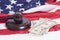 Judge gavel, Dollar banknotes and American flag