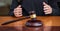 Judge gavel on law court bench, blur female hands, close up view