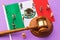 Judge gavel, Mexico flag and plastic toy men on colored background, Mexican society litigation concept