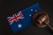 Judge gavel near the Australian flag. Court in Australia. Australian auction