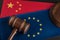 Judge gavel over european and China flag. Legal fight. Relationship between EU and China