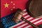 Judge gavel over usa flag and China. Trade war between China and the United States. Legal fight