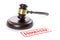 Judge gavel and a red stamp with the German word Insolvenz meaning insolvency isolated on a white background