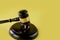 Judge gavel and two golden marriage ring, Contract decree of divorce dissolution or cancellation of marriage