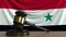 Judge`s gavel and block against the flag of Syria. Syrian court conceptual animation