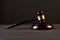 Judge`s Gavel over black background