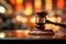 Judge\\\'s gavel resting on desk, with blurry background. Concept of legal and justice-related designs, courtroom scenes