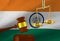 Judge`s gavel and scales against the background of the flag of Republic of India. 3D- image