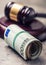 Judge\'s hammer gavel. Justice and euro money. Euro currency. Court gavel and rolled Euro banknotes.