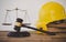 Judge\\\'s hammer and helmet Law and Justice about labor law concept Construction law