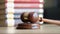 Judicial gavel and books in courtroom closeup