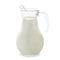 Jug with cow milk filled to the top stands white background. Milk is very healthy