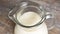 Jug of milk, top view, macro image, avalon, pouring, avalon dai, jug diffuser, bowl