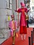 Juggler and Woman on Stilts