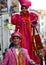 Juggler and Woman on Stilts