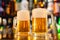 Jugs of beer served on bar counter