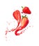 Juice splashes out from cutted strawberries on a white background