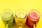 Juices smoothie red green yellow Tropical fruits