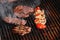 Juicy beef steak flips in a barbecue flame, life style, food photo, copy space