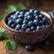 Juicy Blueberries in a Rustic Bowl