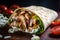 Juicy chicken shawarma wrap with fresh greens and spicy sauce, photographed up close with a blurred background