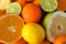 Juicy citrus fruits textured background