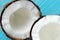 Juicy coconut in two halves with pulp