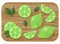 Juicy fresh limes. Sliced fruit on a wooden board.