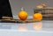 Juicy fresh oranges lie on a table in the kitchen and knife. The concept of proper nutrition and preparation of orange juice, copy