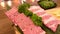 Juicy fresh premium raw meat steak preparing for grill in Japanese style BBQ barbecue at restaurant. fresh Kobe Wagyu beef raw