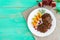 Juicy liver cutlets with pomegranate seeds on a white plate.