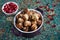 Juicy meat meatballs with pomegranate seeds.