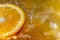 Juicy orange slice with a vibrant water splash, rich in vitamin C