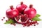 Juicy pomegranates, white background