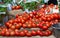 Juicy ripe red tomatos for sale at a vegetable market