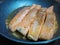 Juicy seasoned salmon frying